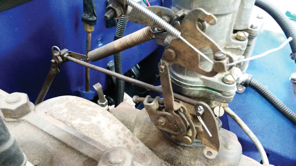 Using your cell phone to take a picture of complex linkage arrangements can make reinstalling an overhauled carb much easier.