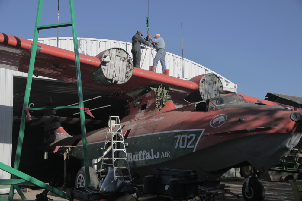 The Canso came out of the farm shop in April to have its wing attached as the end of its eight-year restoration neared.
