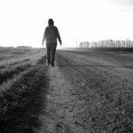 woman walking down a road