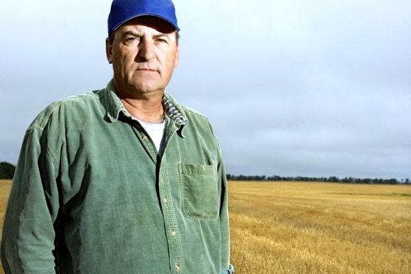 farmer standing in a field