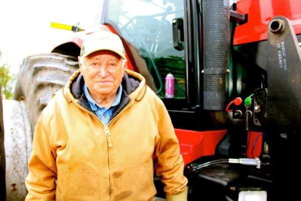 90 year old farmer with tractor