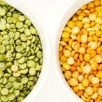 Green and yellow peas in white bowls