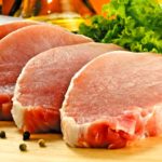 Fresh raw pork on cutting board