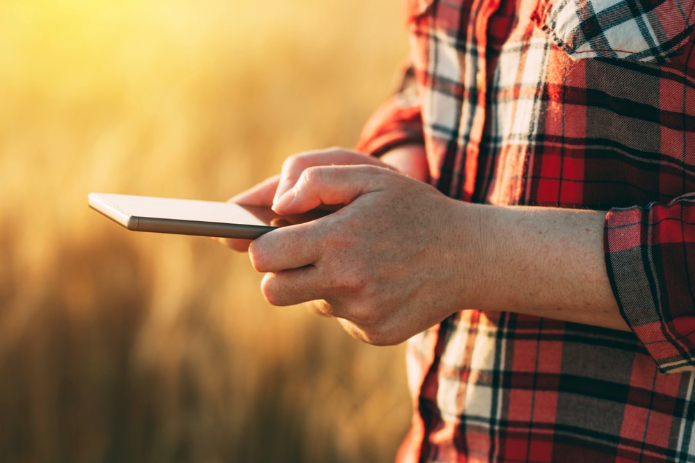 farmer on phone