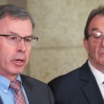 Azure Sustainable Fuels Corp. CEO Douglas Cole speaks at a news conference at the Manitoba Legislature on Dec. 19 as Manitoba agriculture minister Ron Kostyshyn looks on.