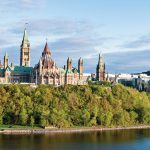 View of the Canadian parliament building from across the river.