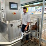 Lester Martin stands with the Uddermatic automated calf feeding system that he designed. This is the second year that a fully operating system – feeding Martin’s own veal calves from his Mildmay-area farm – has been in place at the Dairy Innovation Centre during Canada’s Outdoor Farm Show. Photo: Stew Slater