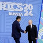 Russian President Vladimir Putin greets Venezuelan President Nicolas Maduro during an official welcoming ceremony for delegations' heads at the BRICS summit in Kazan, Russia October 23, 2024. REUTERS/Maxim Shemetov/Pool