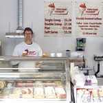 John Pruim standing in his ice cream shop