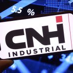 Photo illustration of the CNH Industrial logo on a smartphone screen