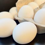 Carton of white eggs.