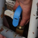 A close-up of someone vaccinating a cow.