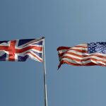 British and American flags flying side by side.