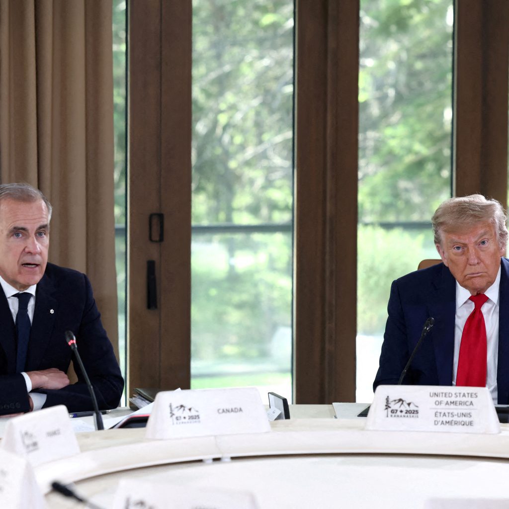 U.S. President Donald Trump and Canadian Prime Minister Mark Carney attend a meeting with G7 leaders and guests, at the G7 summit in Kananaskis, Alberta, Canada, June 16, 2025.