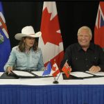 Premiers Doug Ford and Danielle Smith signed two MOUs Monday in Calgary. Screenshot taken from YouTube livestream.
