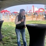 Tessa Thomas speaks at Ag in Motion about the importance of biosecurity. Tuesday was the second day of the Livestock Happy Hour speaker series. Photo: Melissa Jeffers-Bezan