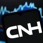 In this photo illustration, the CNH Industrial logo is seen displayed on a smartphone screen.