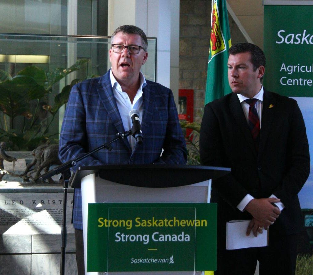 Saskatchewan premier Scott Moe, left, and Kody Blois, parliamentary secretary to the prime minister, participate in a press conference prior to their mission to China.