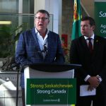 Saskatchewan premier Scott Moe, left, and Kody Blois, parliamentary secretary to the prime minister, participate in a press conference prior to their mission to China.