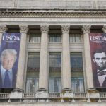 Banners of U.S. President Donald Trump and President Abraham Lincoln reading "Growing America Since 1862" hang over the entrance to the United States Department of Agriculture (USDA) in Washington, D.C., U.S., May 15, 2025. Photo: REUTERS/Kevin Lamarque/File Photo