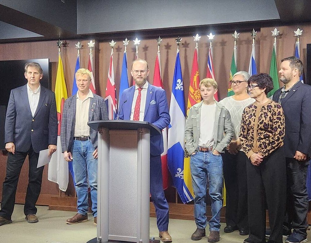 A press conference spotlighting the struggles of Canadian beekeepers took place in Ottawa Nov. 25.  Left to right: Peter Awram, Canadian Beekeepers Federation; Curtis Miedema, president, Alberta Beekeepers Commission; MP Arnold Viersen; Owen Miedema; Amber Ozero, director, Alberta Beekeepers Commission; Connie Phillips, executive director, Alberta Beekeepers Commission and Richard Ozero, Good Morning Honey. PHOTO: SUPPLIED BY JOEL OOSTERMAN.