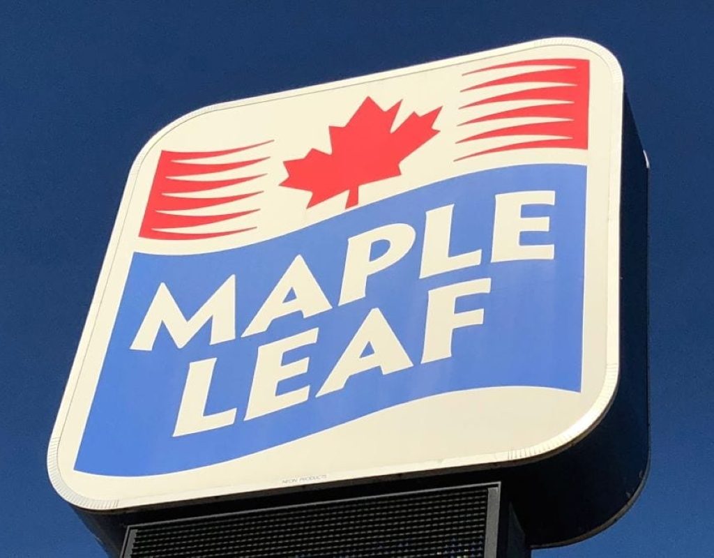Close-up on a Maple Leaf Foods sign.