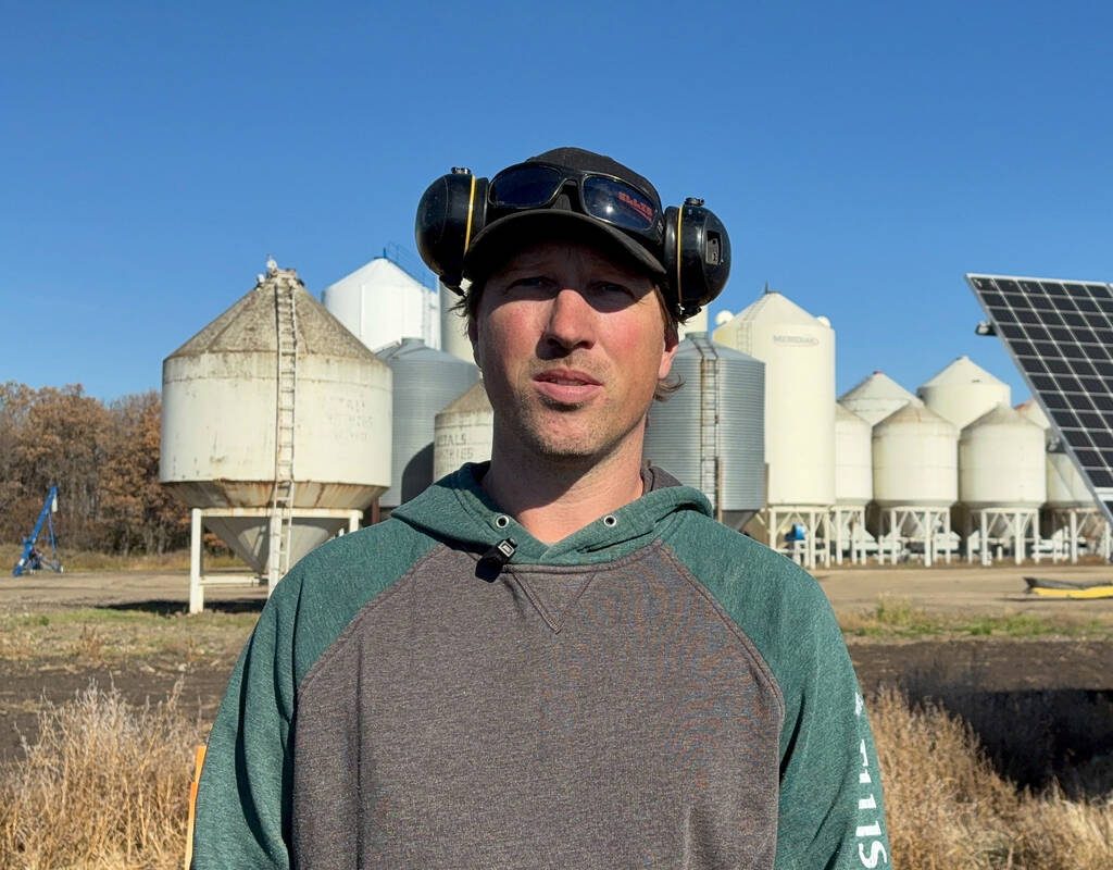 Farmer Simon Ellis looks on at his farm, which has suffered wild weather swings in recent years, in Wawanesa, Manitoba, October 23, 2025.