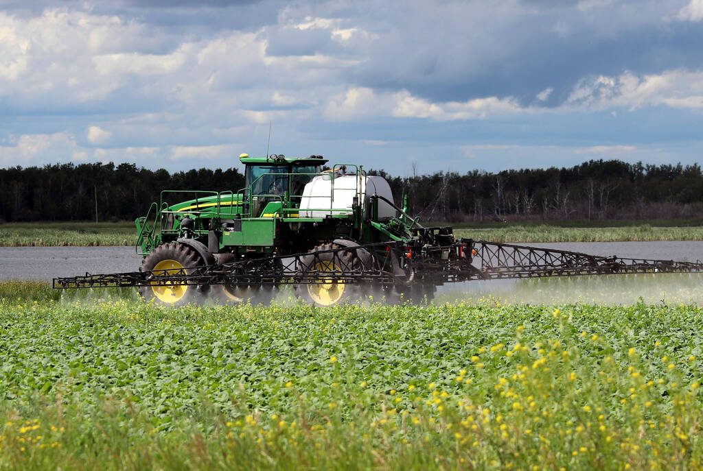 A boom sprayer applies a crop protection product on a field. PHOTO: FILE