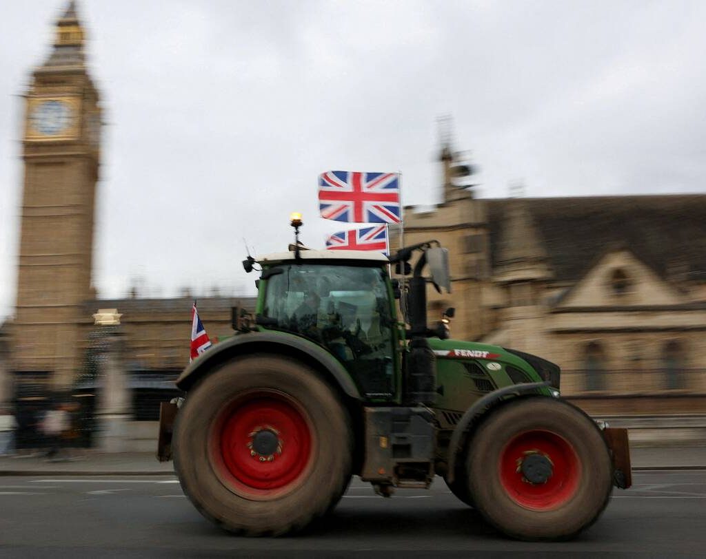 A demonstrator drives a tractor during a protest by UK farmers opposing government inheritance tax reform plans, outside of the Houses of Parliament in London, Britain, December 16, 2025. Photo: REUTERS/Corey Rudy TPX IMAGES OF THE DAY