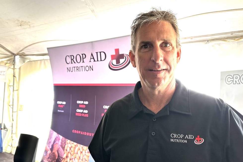 Darren Sander, owner of Crop Aid Nutrition Ltd., at his company’s booth at Ag in Motion 2025. Photo: Don Norman