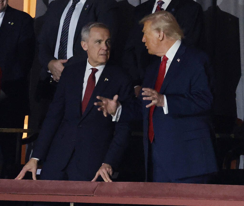 FILE PHOTO: Prime Minister Mark Carney and U.S. President Donald Trump during the FIFA World Cup 2026 draw on Dec. 5, 2025.