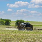 A crop sprayer applies pesticide or herbicide on a field. Photo: Lisa Beeby/Getty Images Plus