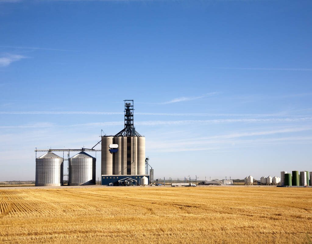 Prairie elevator and grain bin in the morning, Saskatchewan, Canada. Photo: Getty Images Plus