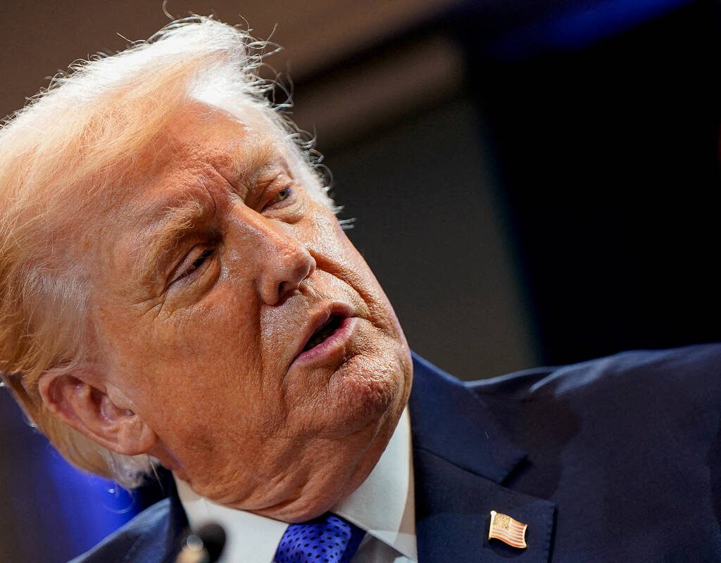 U.S. President Donald Trump speaks during a press briefing at the White House, following the Supreme Court's ruling that Trump had exceeded his authority when he imposed tariffs, in Washington, D.C., U.S., February 20, 2026.