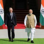 Canada's Prime Minister Mark Carney walks with his Indian counterpart, Narendra Modi, before their meeting at Hyderabad House in New Delhi, India, March 2, 2026. REUTERS/Adnan Abidi