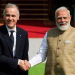 Canada's Prime Minister Mark Carney walks with his Indian counterpart, Narendra Modi, before their meeting at Hyderabad House in New Delhi, India,