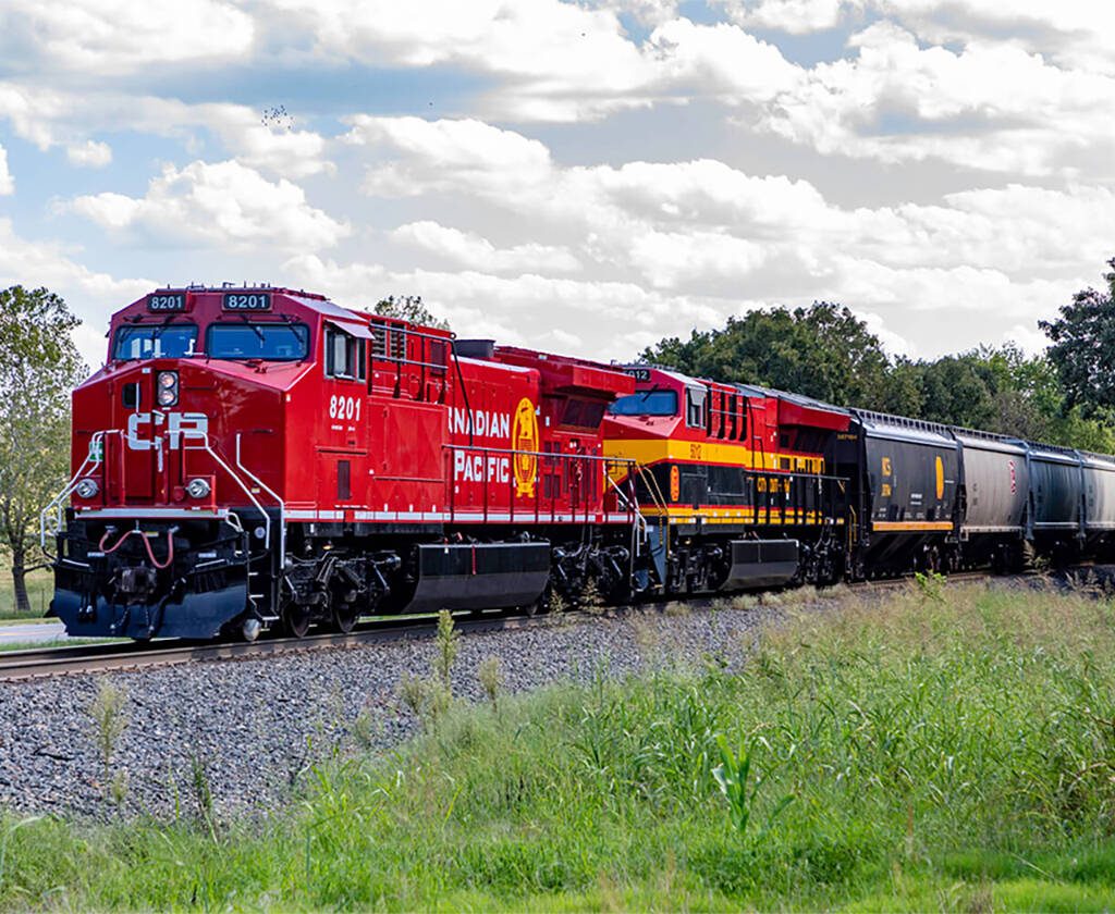 A red CPKC locomotive.