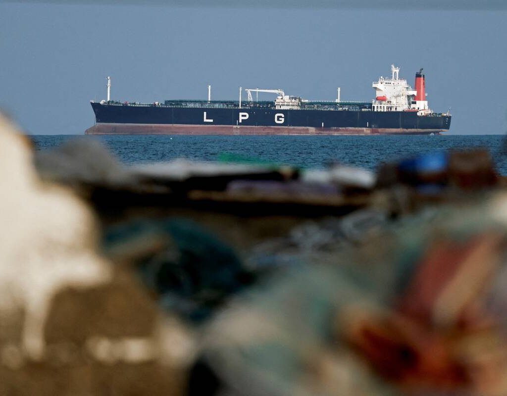 An LPG gas tanker at anchor as traffic is down in the Strait of Hormuz, amid the U.S.-Israeli conflict with Iran, in Shinas, Oman, March 11, 2026. Photo: REUTERS/Benoit Tessier
USABLE UNTIL APRIL 8, 2026