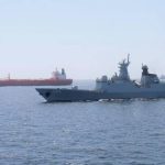 A Pakistan Navy ship escorts a Pakistani merchant vessel, as part of a maritime security operation, named Muhafiz-ul-Bahr, as regional tensions threaten key sea routes, amid the U.S.-Israeli conflict with Iran, at an unidentified location, released March 9, 2026, in this screen grab taken from a handout video. Photo: ISPR/Handout via REUTERS