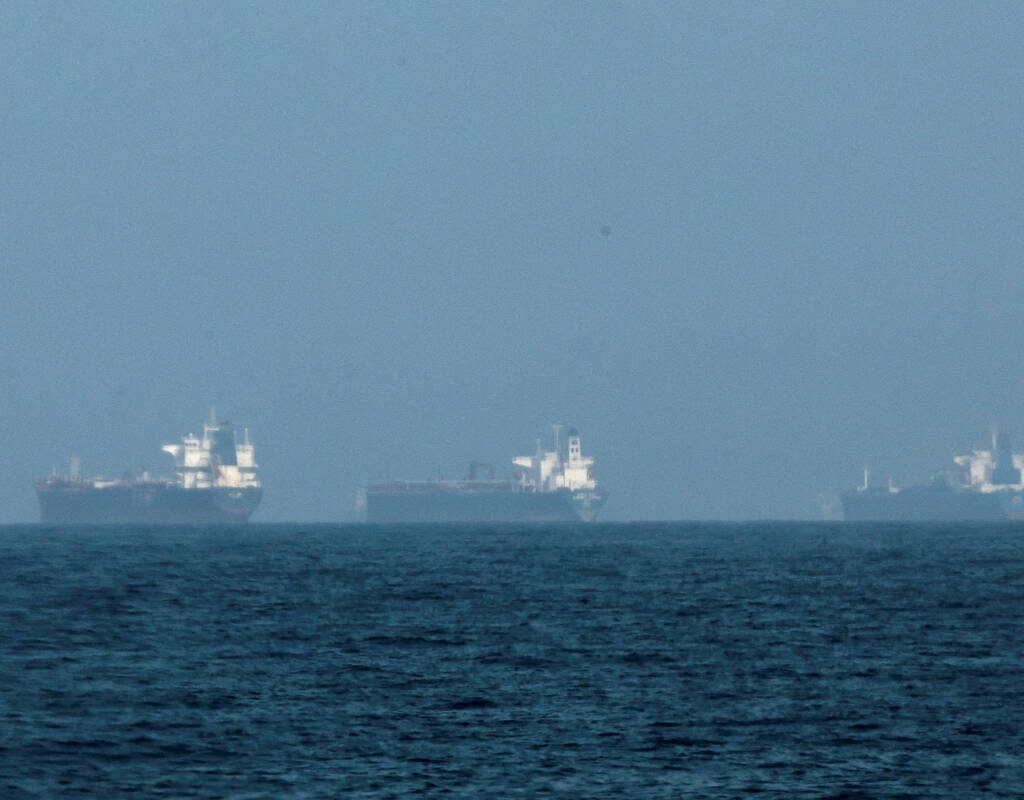 FILE PHOTO: Tankers are seen off the coast of Fujairah on March 3, 2026. REUTERS/Amr Alfiky/File Photo