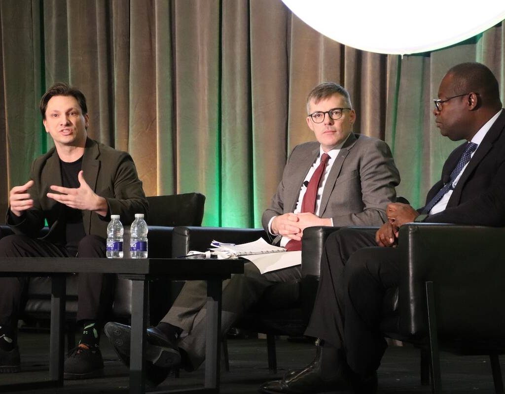 (Left to right) Jeff Mahon, Greg MacDonald and Edwini Kessie speak on a panel at the Canadian Crops Convention in Toronto on March 12. Photo: Jonah Grignon
