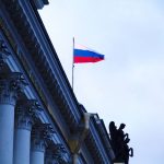 The Russian flag flies on the top of a building in Senate Square in Saint Petersburg, Russia at sunset. Photo: Anna Linda Knoll/Getty Images Plus