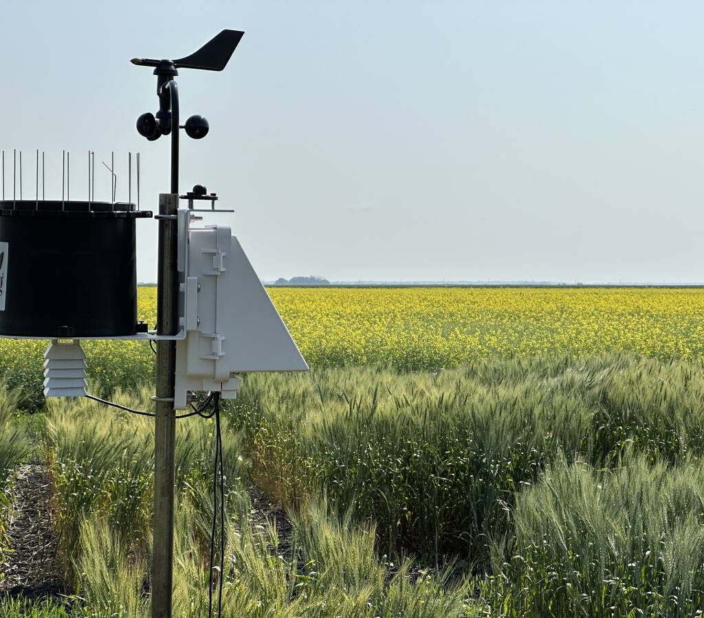 A field weather station collects site-specific data on a Prairie farm. ECCC will create a new hybrid weather forecasting model, combining the predictive abilities of AI and traditional physics-based meteorology and the department’s knowledge of local factors for wind, temperature and precipitation. Photo: Don Norman