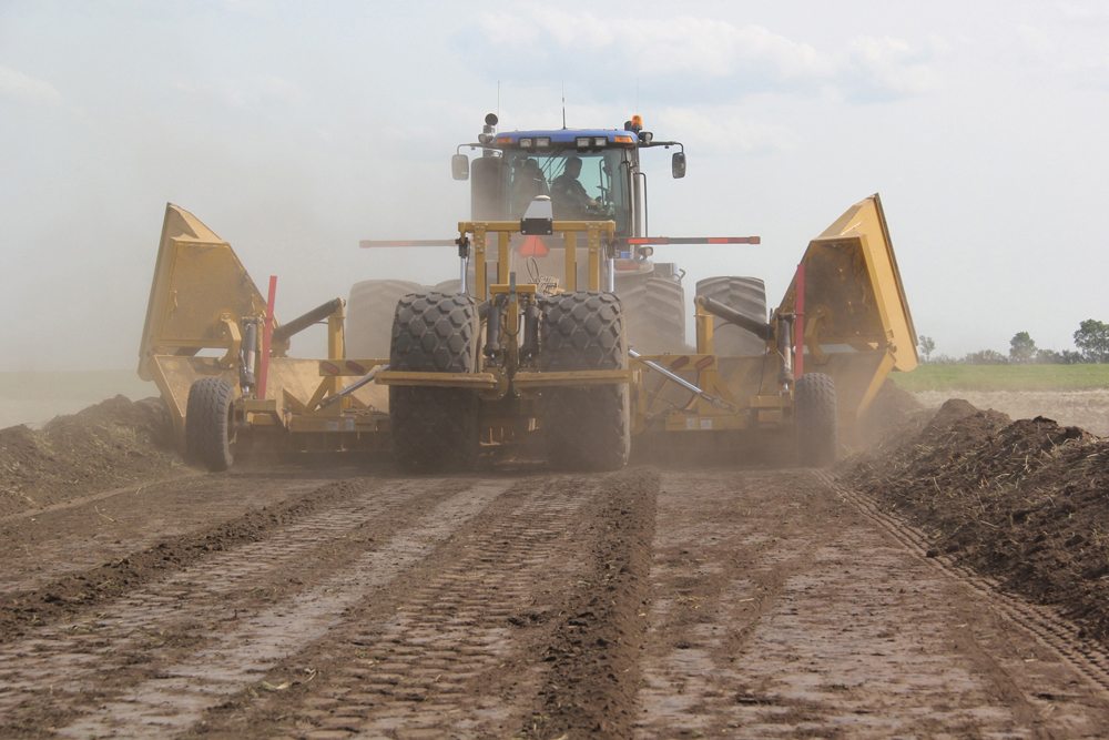 VWing Ditcher designed to take advantage of field water Grainews