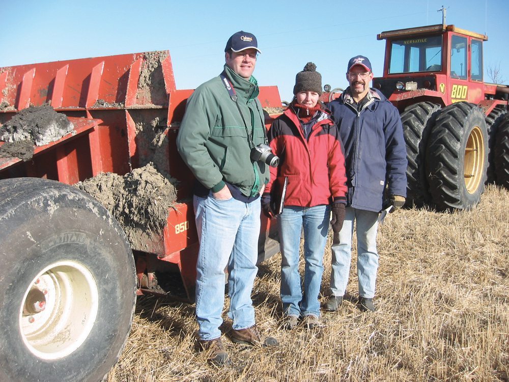 David Lobb (l) of the University of Manitoba, with master’s student Michelle Erb and Treherne-area farmer Dallas Timmerman in November 2004 while working on a study into tillage-eroded soils and the efficacy of moving the eroded soil from low parts of the field back to the hilltops.