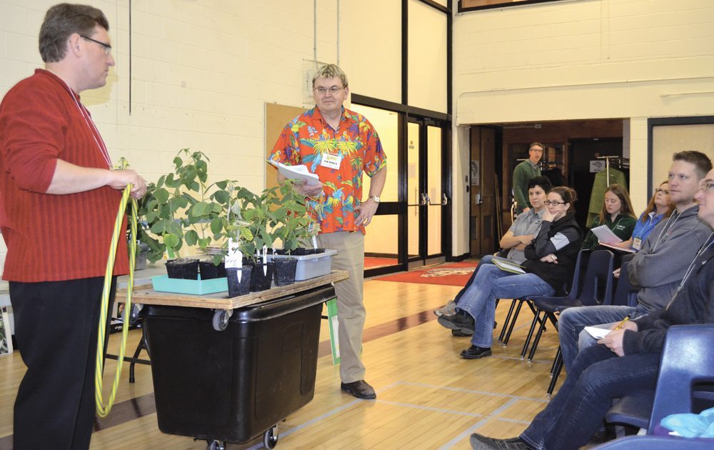 Terry Buss (l) and Dennis Lange (r), farm production advisers with Manitoba Agriculture, Food and Rural Development, spoke on the benefits and challenges of growing soybeans.