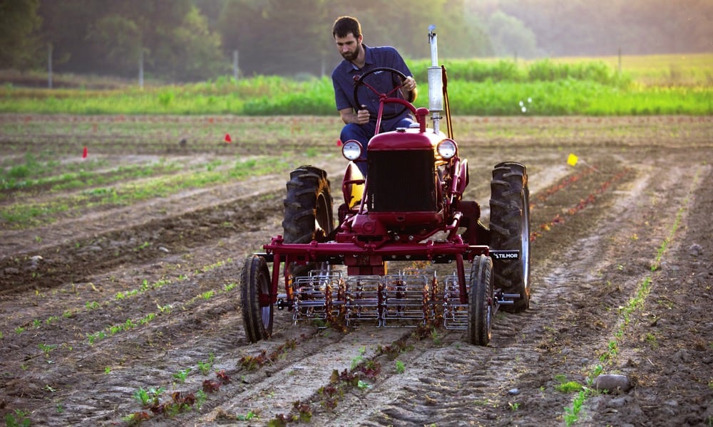 man on tractor